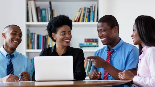 depositphotos_309049424-stock-photo-african-american-business-team-talking.webp